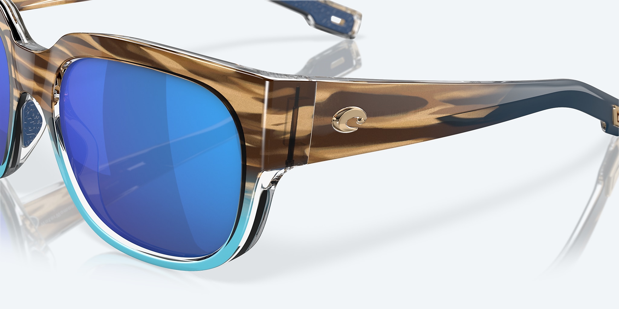 Sunglasses Costa Waterwoman M (55-18) with Blue Mirror lens and Shiny Wahoo frame Image 6 of 7 Sunglasses Costa Waterwoman M (55-18) with Blue Mirror lens and Shiny Wahoo frame Image 6 of 7